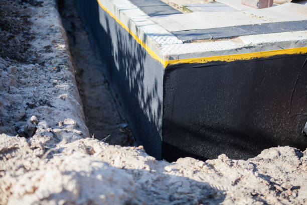 Professional Waterproofing technician working in Glencoe, IL